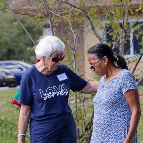 Val Praying Love Serves Feed The Block HomesUnited Ministries (1)