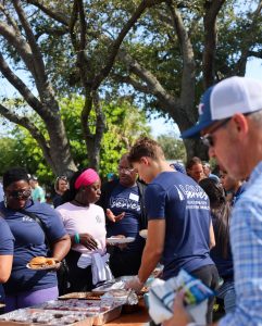 Serving dinner Love Serves Feed The Block HomesUnited Ministries (2)