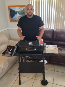 homes united the homeless project david putting together a grill caro