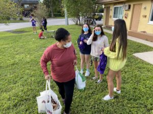 The Homeless Projects Love Serves Children Donating Food