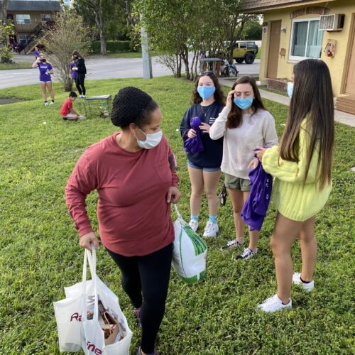 The Homeless Projects Love Serves Children Donating Food