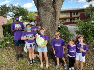 The Homeless Projects Love Serves Children Donating Food