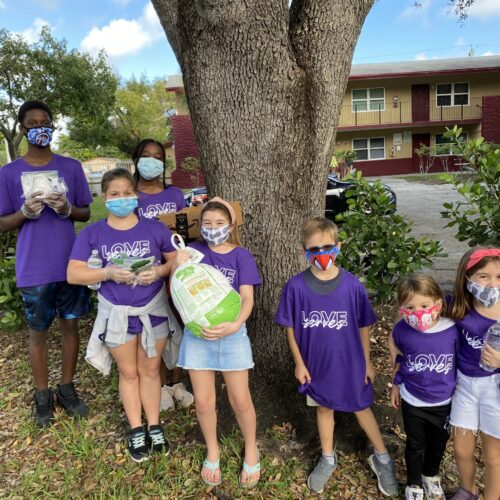 The Homeless Projects Love Serves Children Donating Food