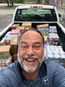 The Homeless Projects Pastor Duane Picking Up And Delivering Food To The Houses