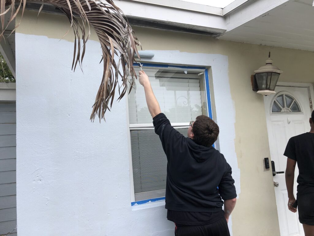 The homeless Projects high school painting volunteers1